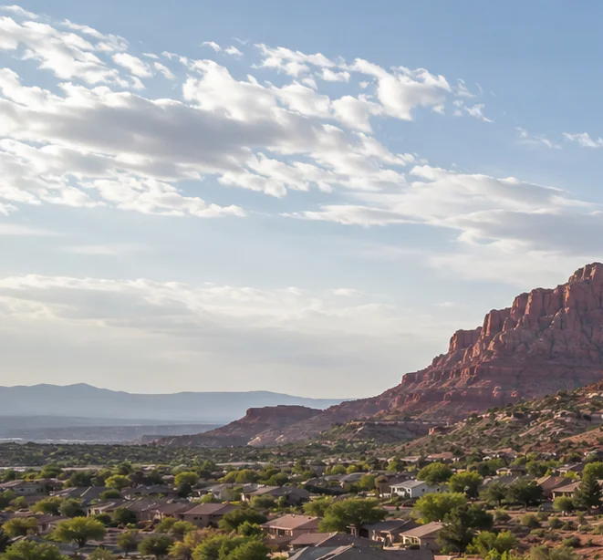 St. George homes beneath Southern Utah red cliffs